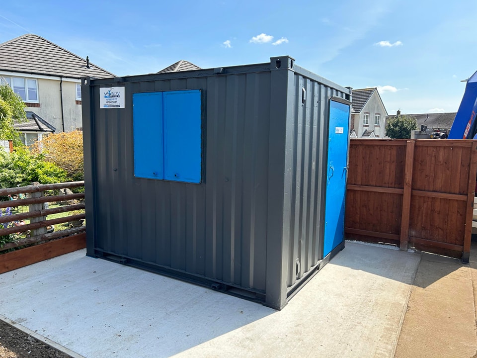 Another happy customer taking delivery of a Garden Office Unit
