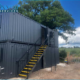Monnow Site Services, a leading provider of modular solutions, showcased their proficiency in delivering on-site facilities as they successfully supplied, delivered, and installed two impressive 32-foot x 10-foot antivandal units. These units, designed to enhance convenience and comfort for workers on the project site, consisted of a canteen and changing room in one unit and an open-plan office in the other.